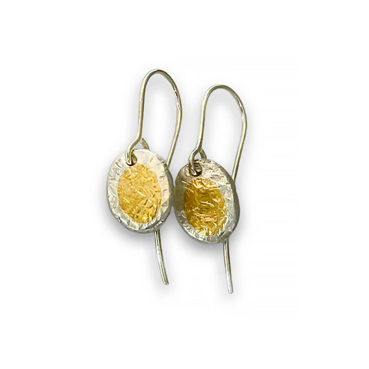 Elevate your look with these fine sterling silver Earrings accented by 24ct gold, boasting a rustic yet elegant appearance. 