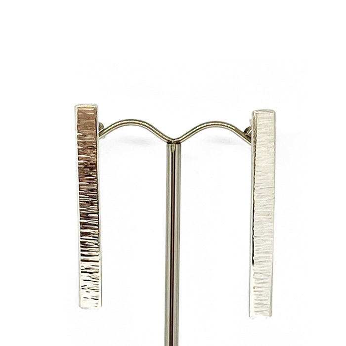 Hammered textured sterling sIlver long studs